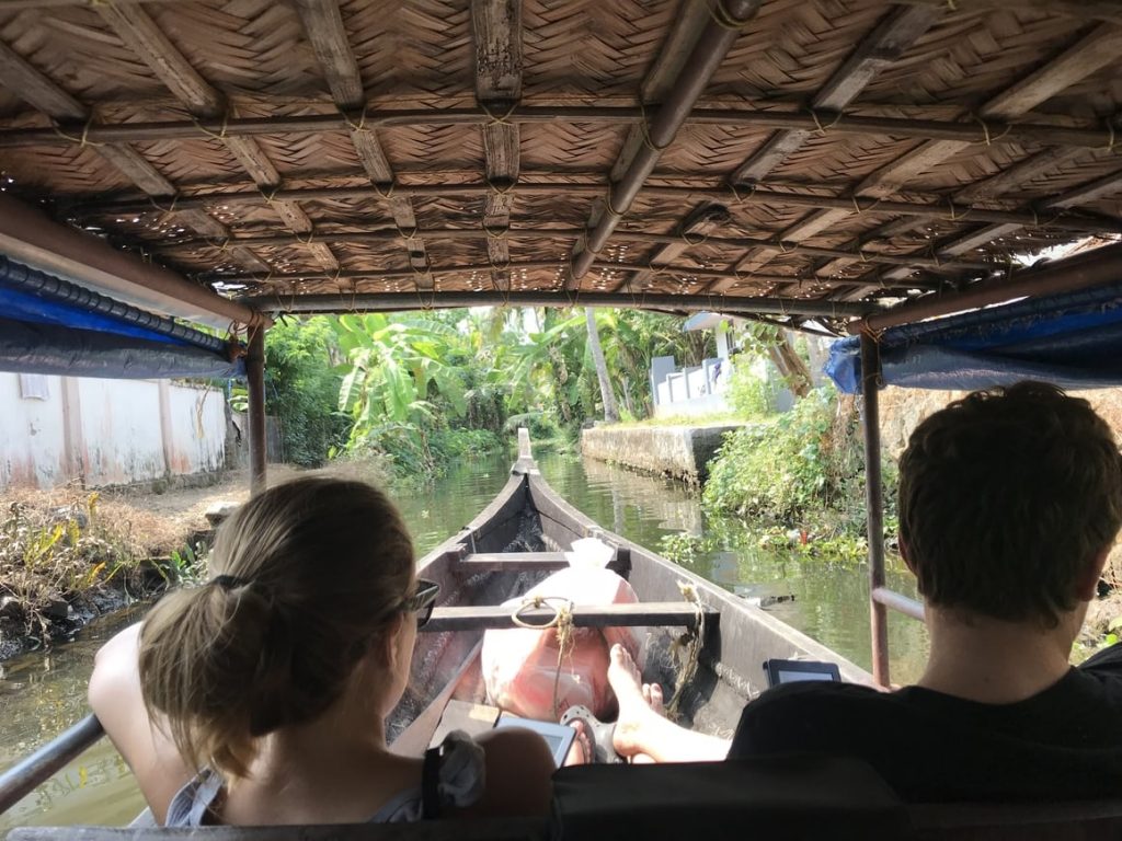 Reading a kindle on the Alleppey backwaters