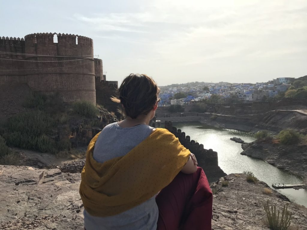 Family travelling blog. Mother sitting in India reflecting on what travel brings