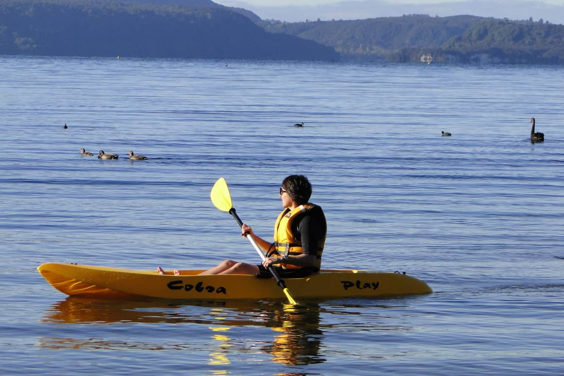 Woman in a kayak in new Zealand