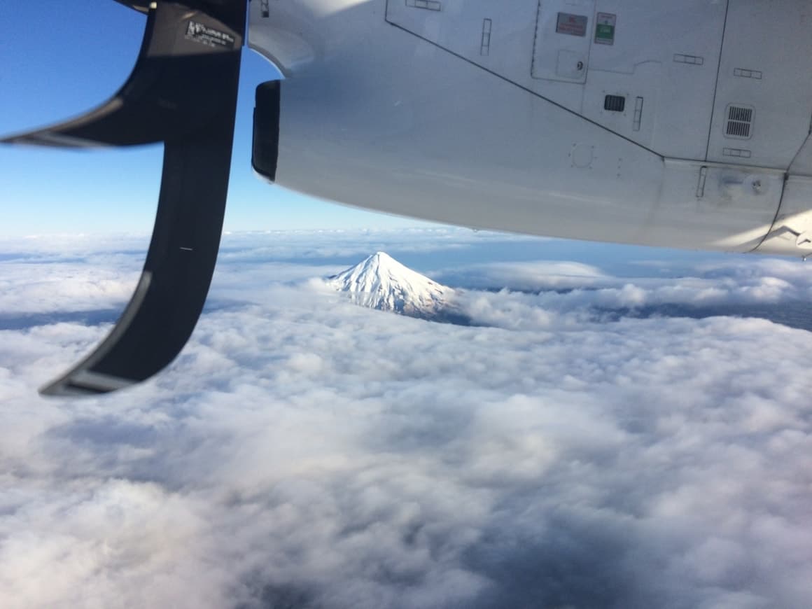 view from the window of a plane. Travel check off list