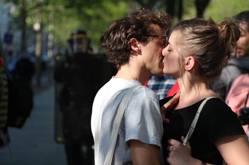 Couple kissing in the streets of Paris