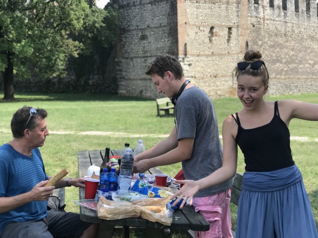 Family having a picnic in Italy