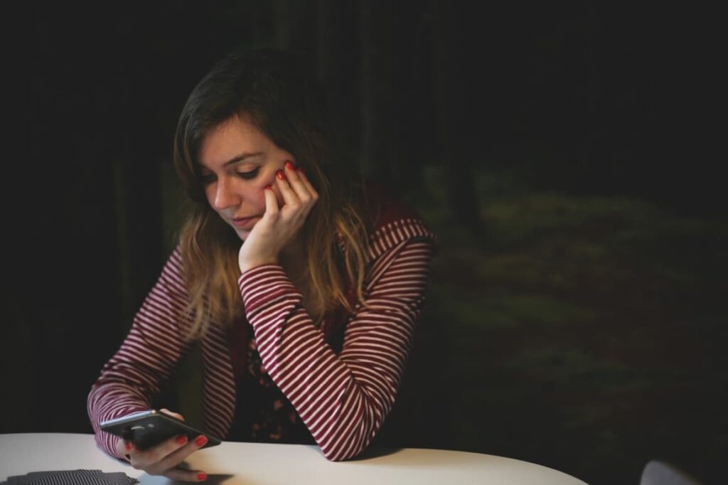 Woman on her phone looking at social media