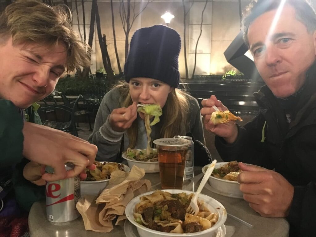 Family eating dinner in NYC