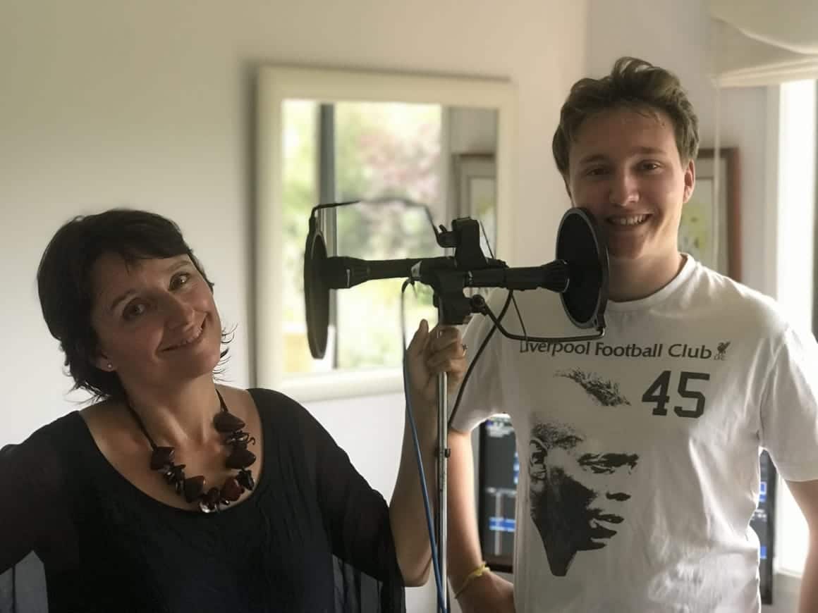 mother and son doing a family travel podcast