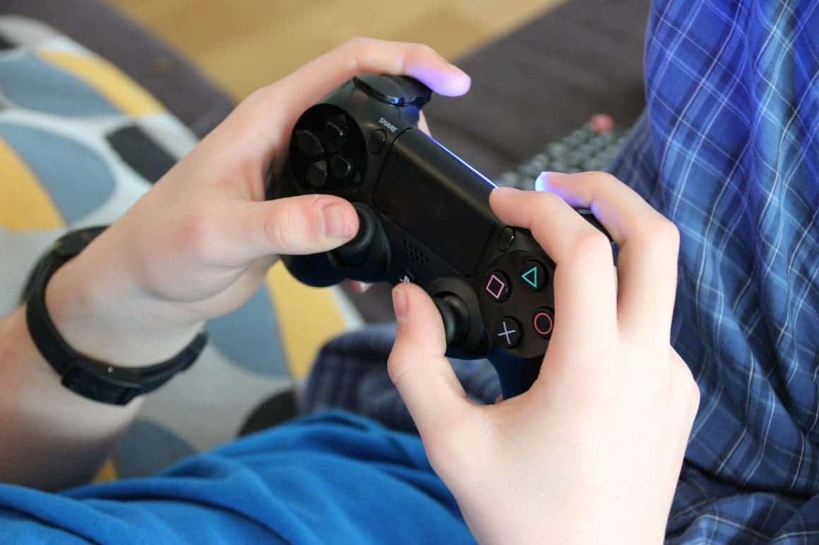 Kid playing a video game