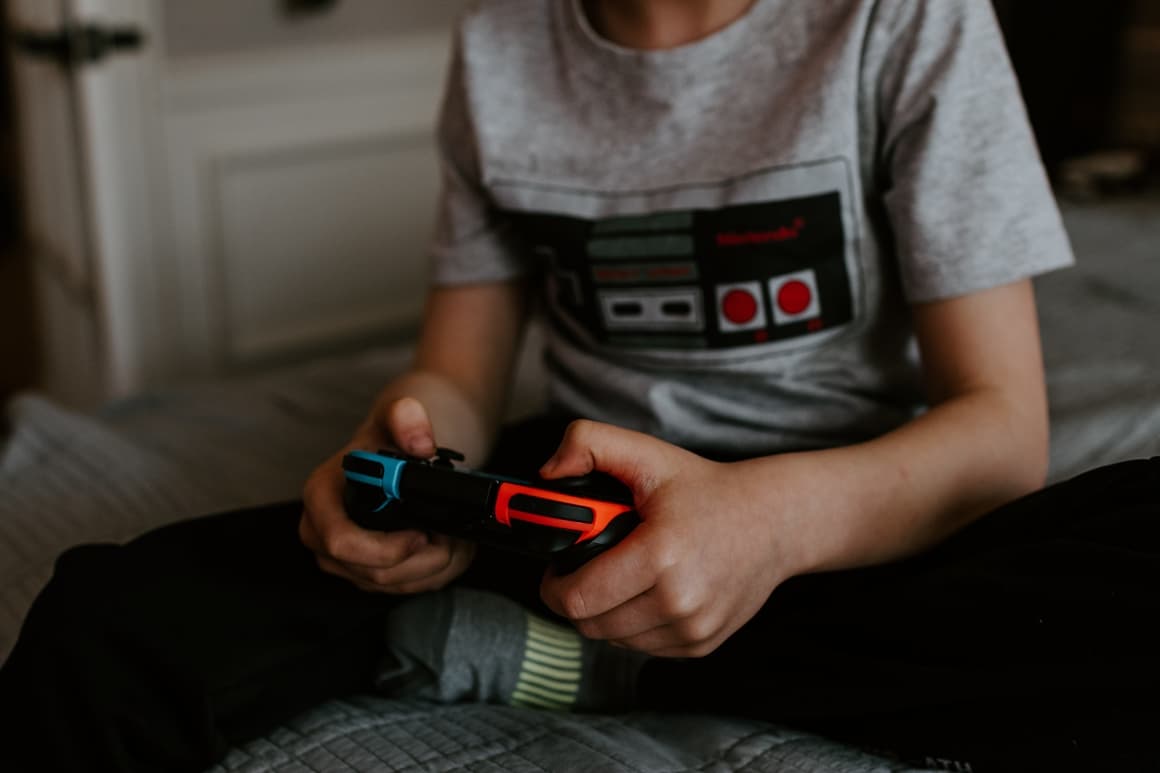 Kid playing a video game