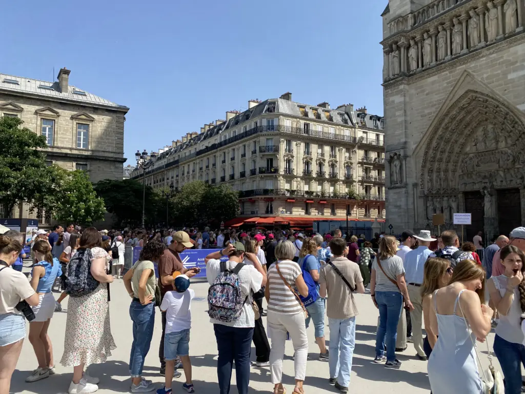 People outside Notre Dame in Paris for one day