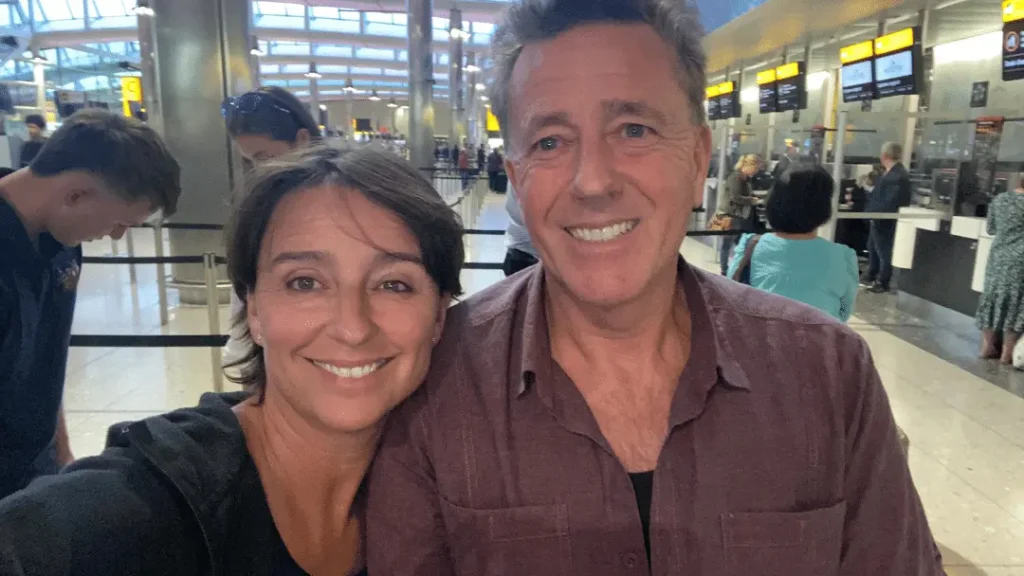 husband and wife at airport. It's a Drama podcast