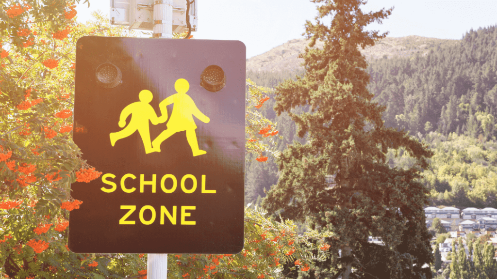 School crossing sign in New Zealand. Being a teacher in New Zealand