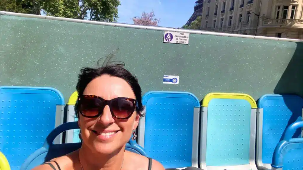 A woman on the tootbus in Paris