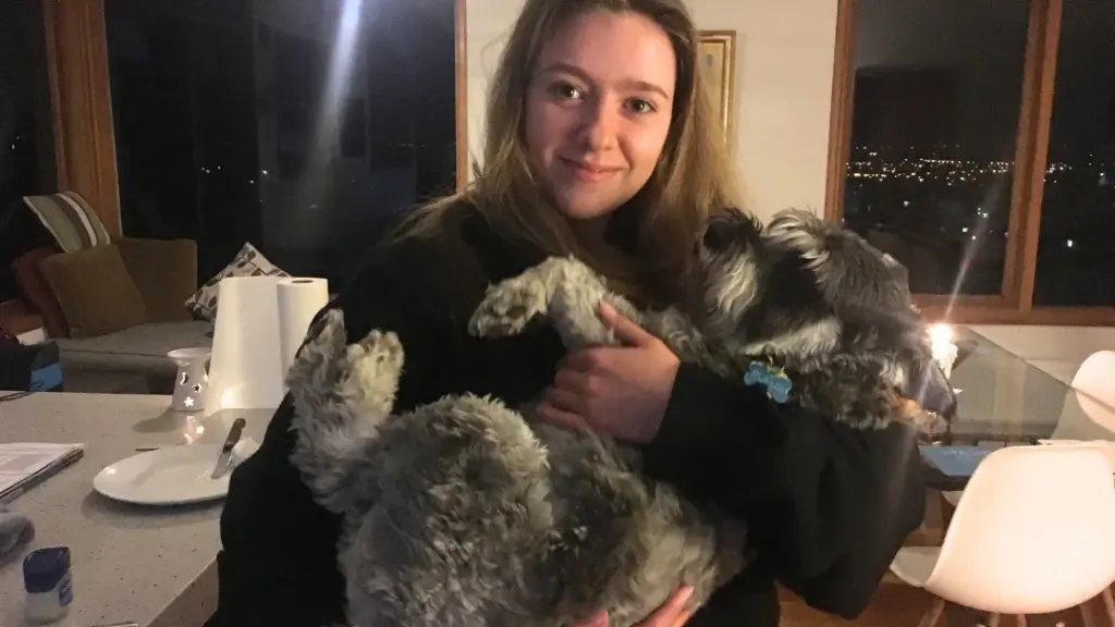 Housesitting in New Zealand. A girl with a cute dog