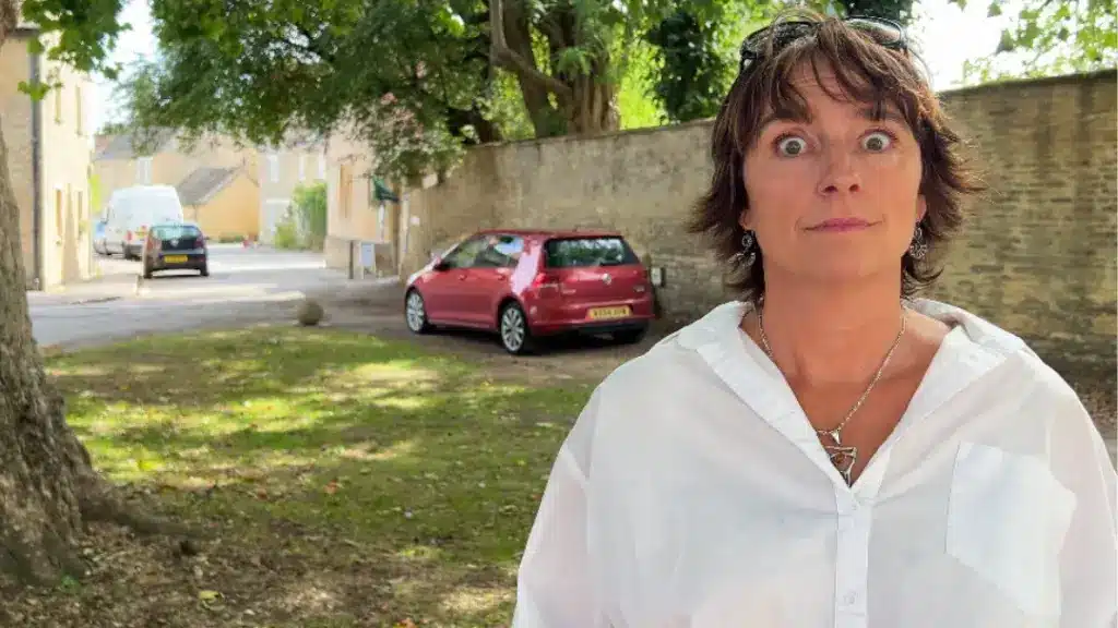 On location at Downton Abbey. Liz, the podcast host of It's a Drama, in the village of Bampton, UK.