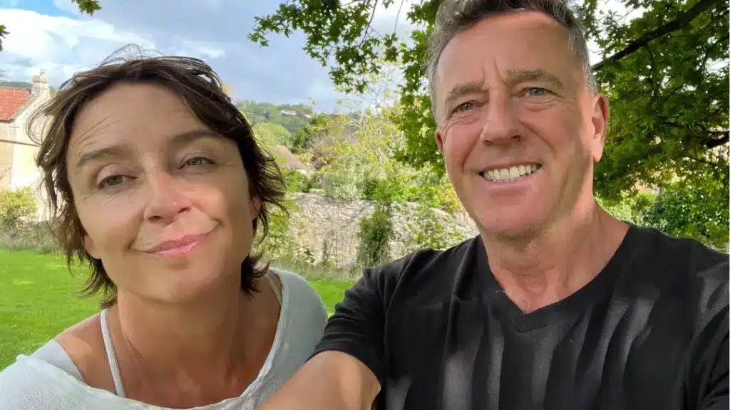 A married couple in England talking on their podcast about stages of grief and loss 