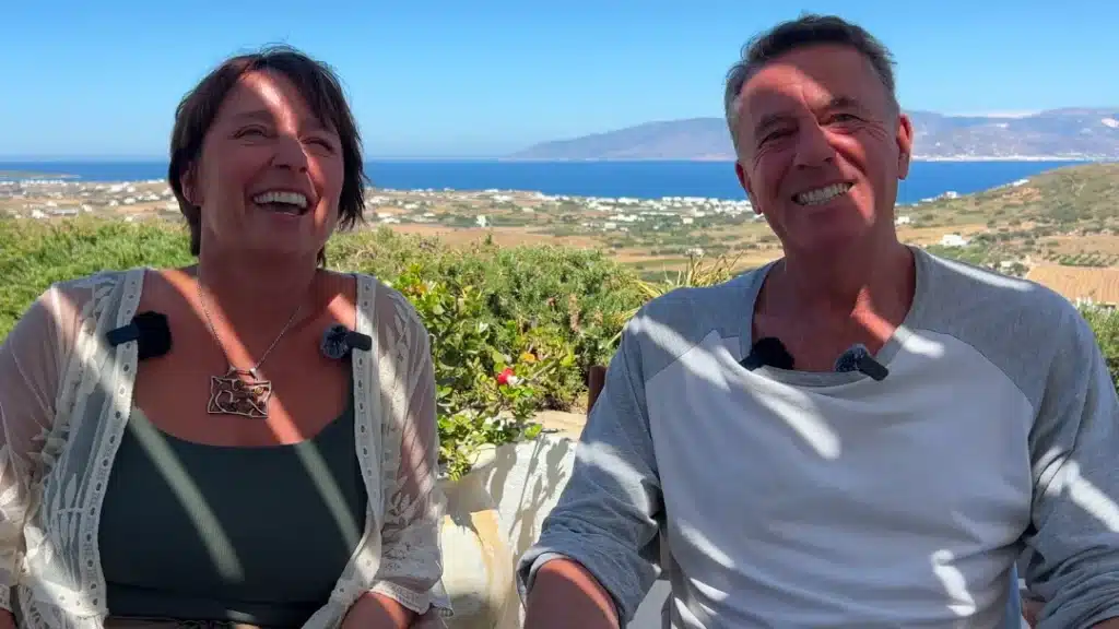 A married couple sharing their podcast and stories from the Island of Paros, Greece