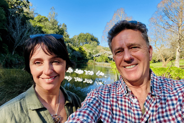 A husband a wife in a park in New Zealand talking about life skills