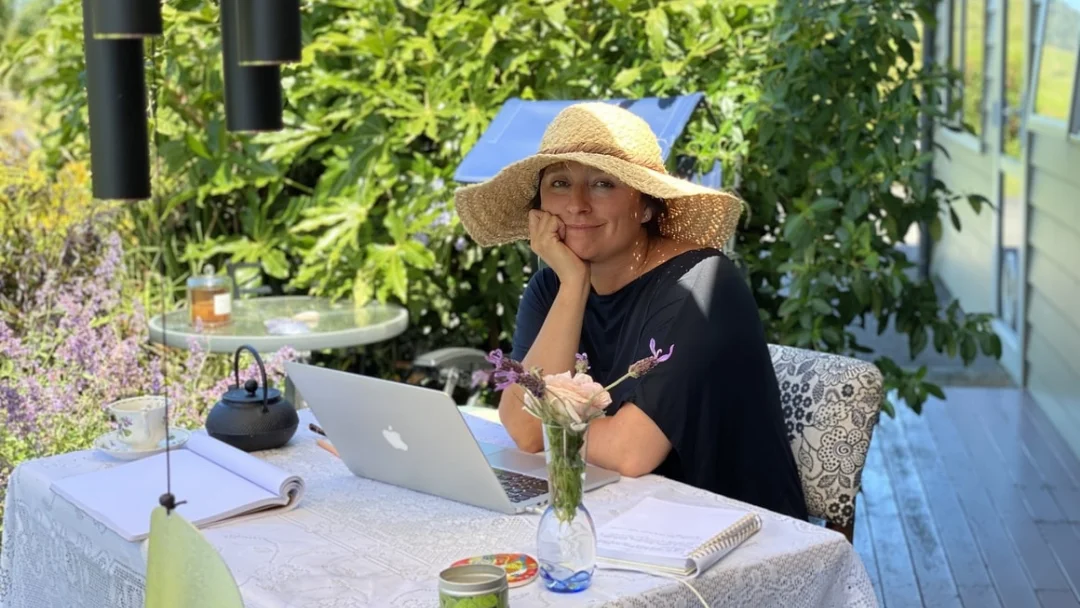Writing a book. The Process of a Beginner Woman writing a book in the garden