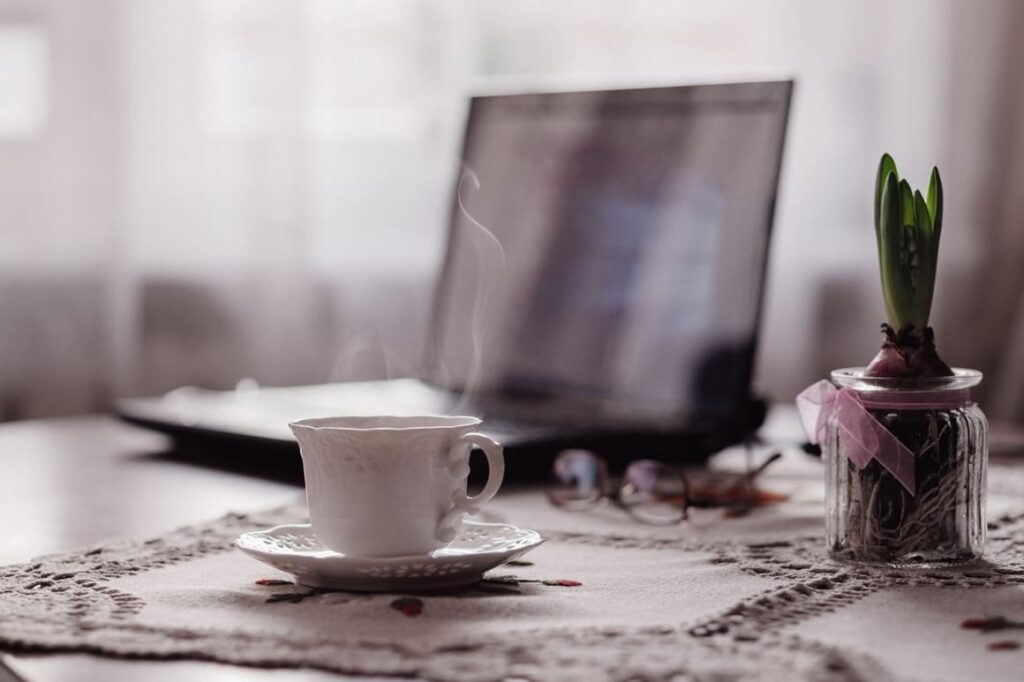 Computer and a cup of tea. Working from home tips