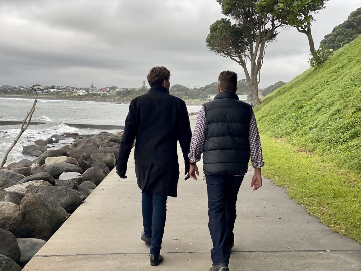 Man and son walking in New Zealand