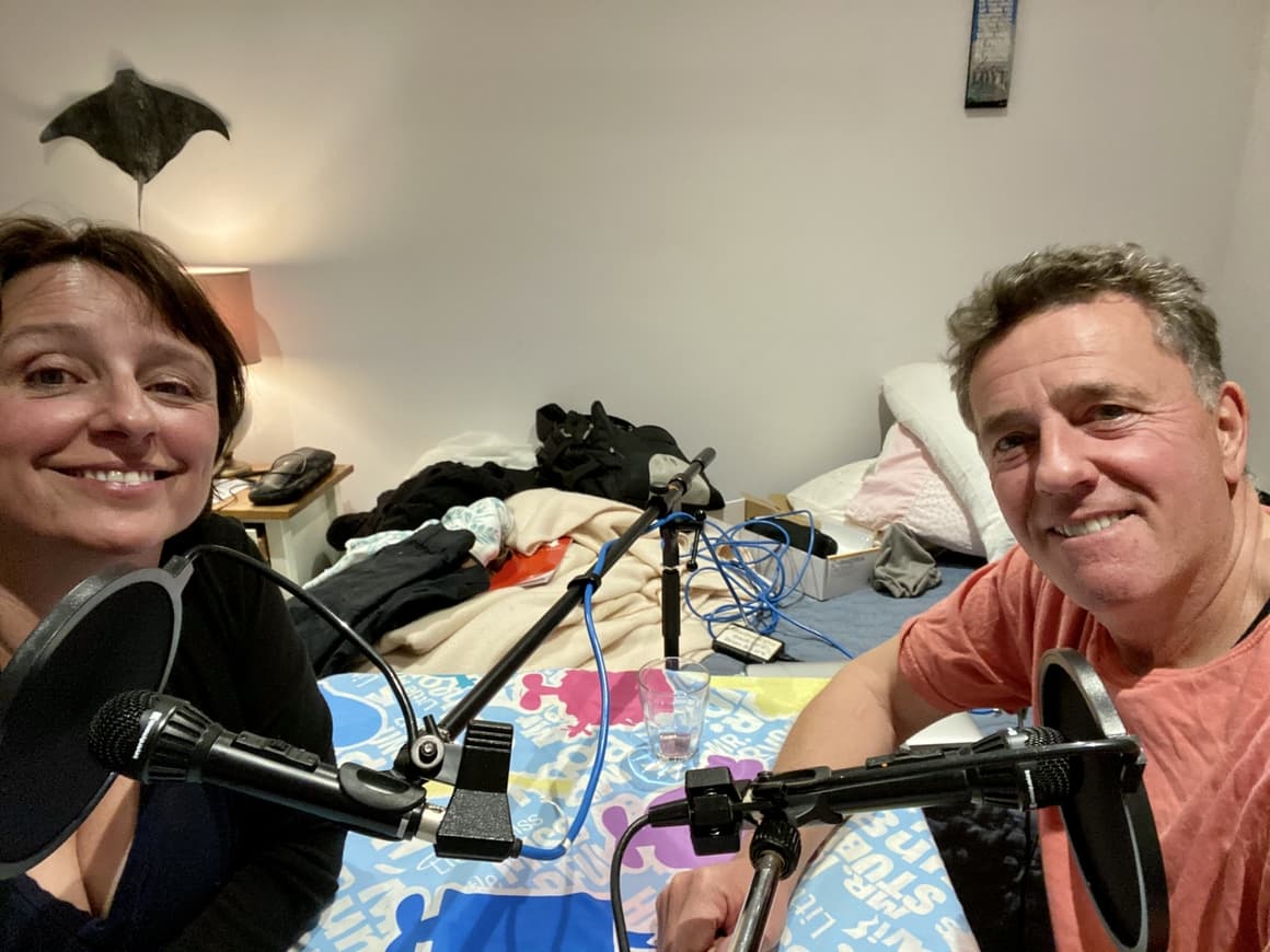 Husband and wife making a podcast episode