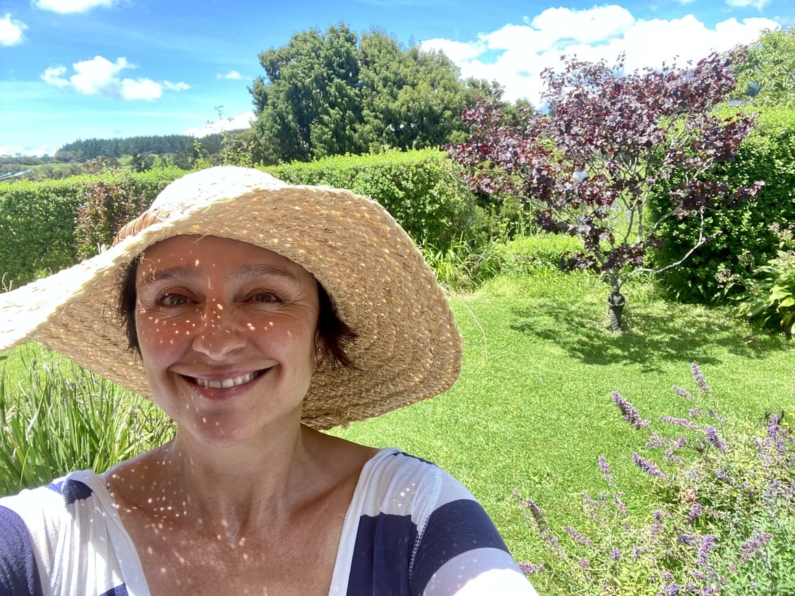 Woman in a garden in New Zealand