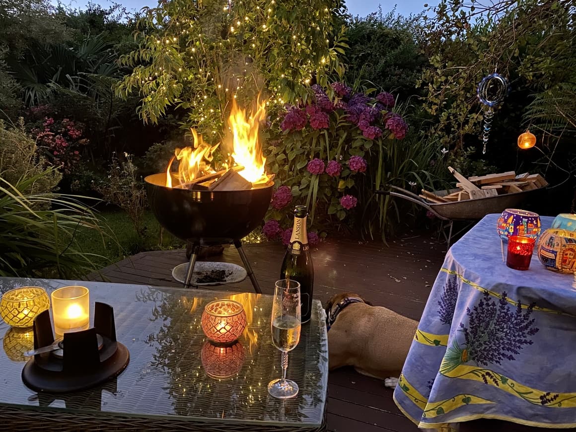 View of a fire and a bottle of champagne in New Zealand