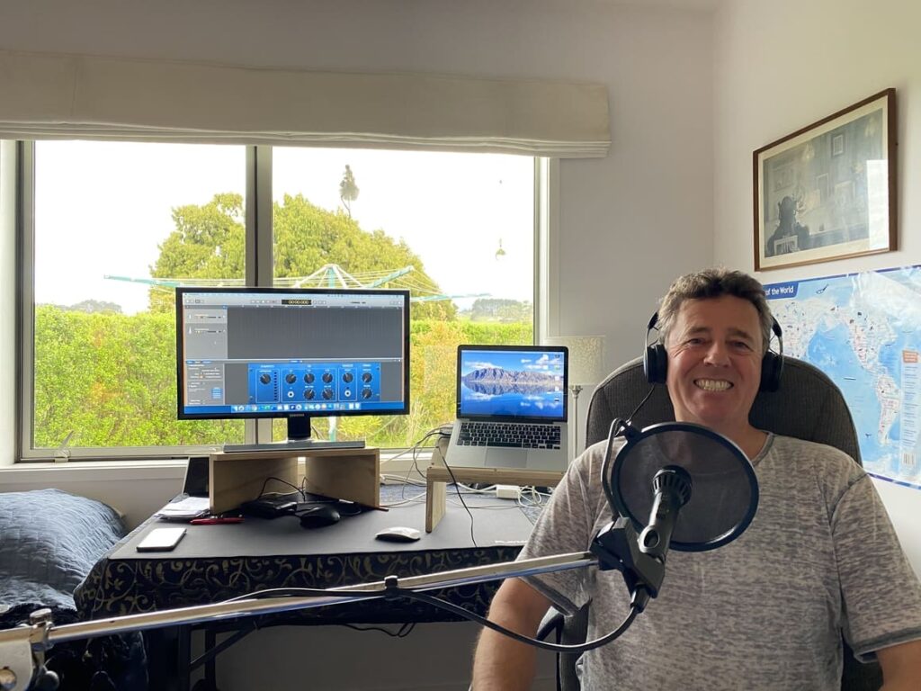 Brian in front of his mega computers making a podcast episode on working from home