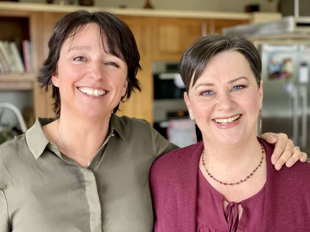 Two women in New Zealand discussing whether food in new Zealand is better?