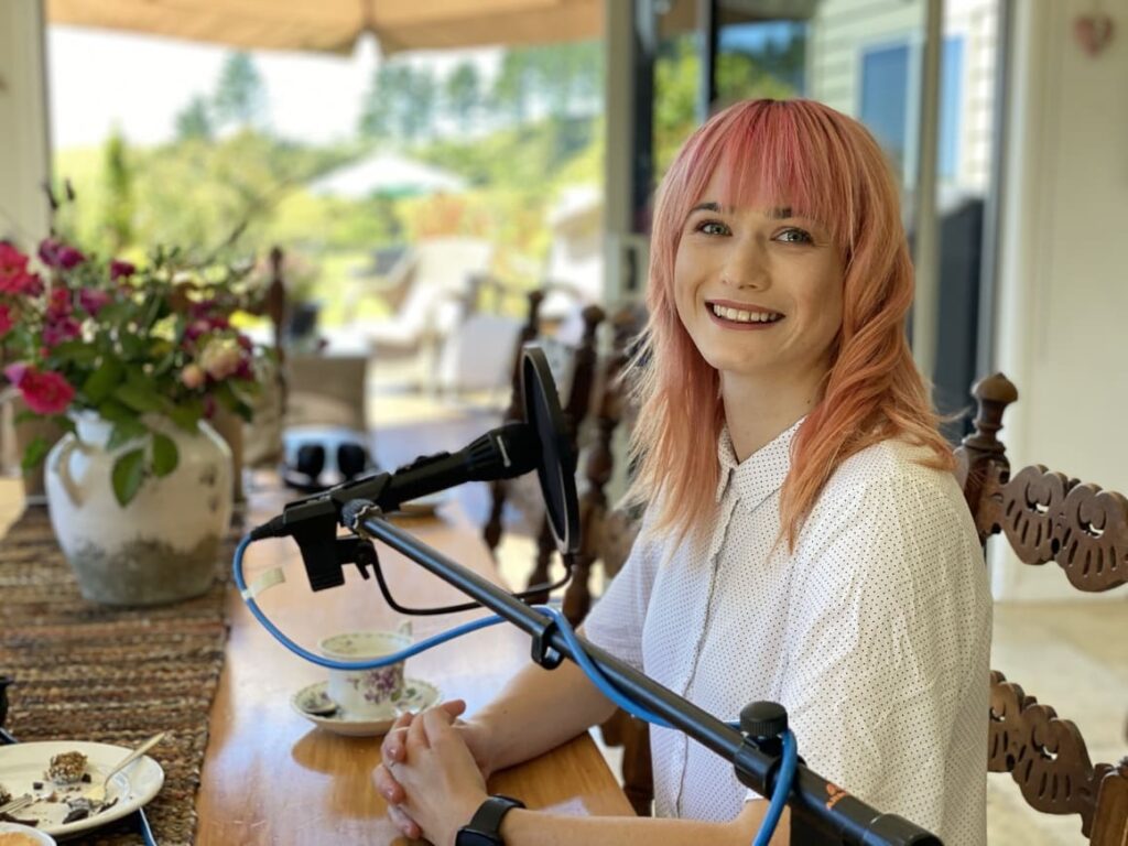 New Zealand woman chatting to a British podcast host