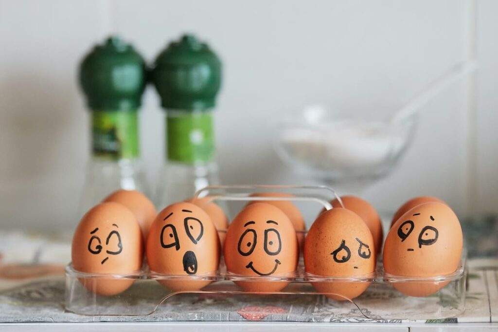 5 Eggs with faces drawn onto them. The pros and cons of homeschooling